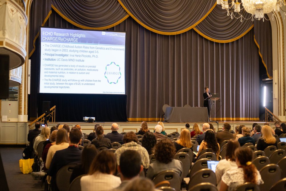 A presentation on the main stage with a seated audience